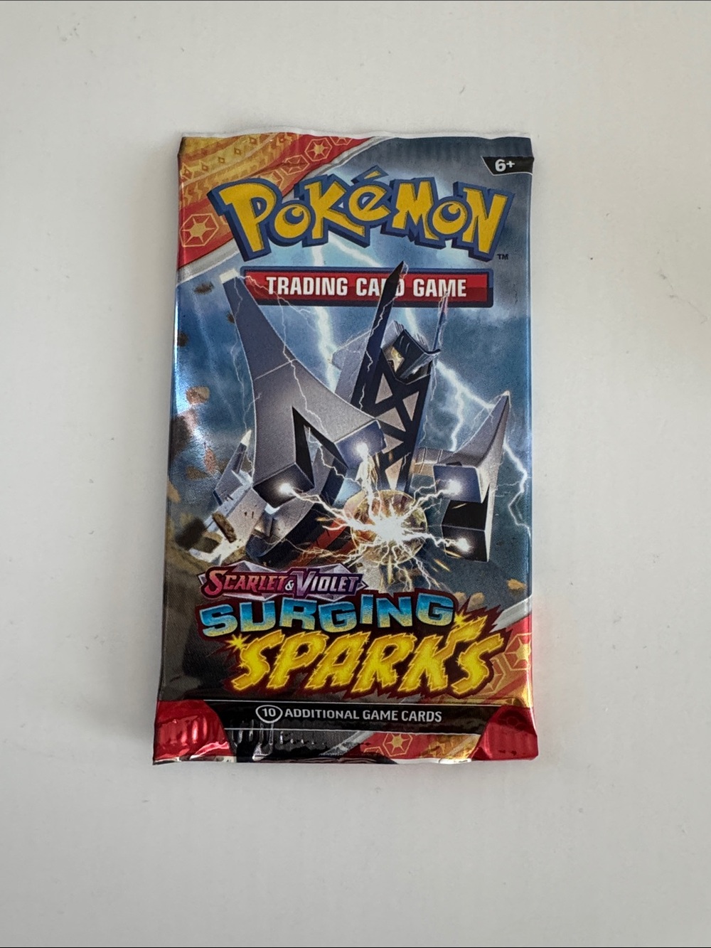 Pokemon Scarlet & Violet Surging Sparks Booster Pack - Blue/Red/Yellow